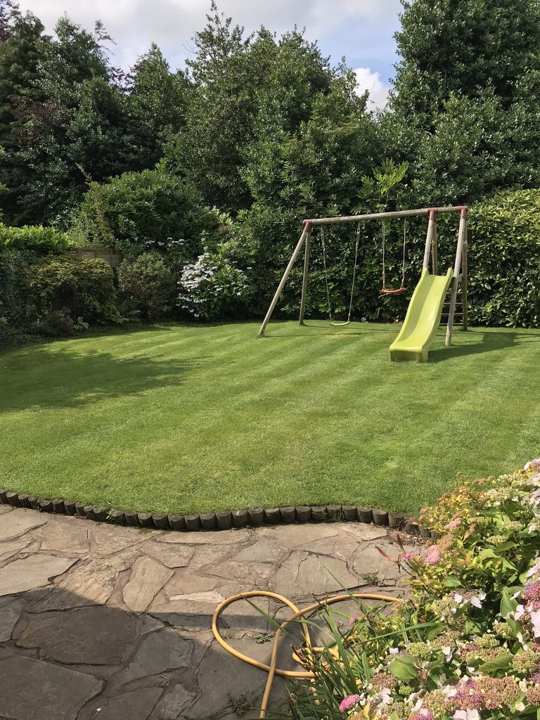 Stripey-lawn-wooden-swing-slide