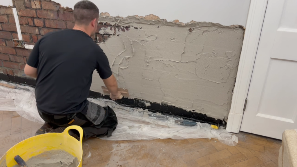 First coat of damp resistant plaster